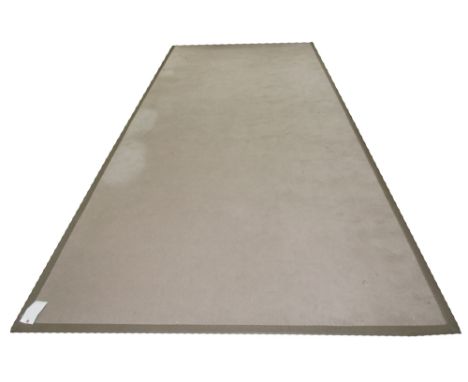 TIM PAGE (CHELSEA HARBOUR) CARPET, 503cm x 202cm, off white field with a leather border, RRP £5383.05.