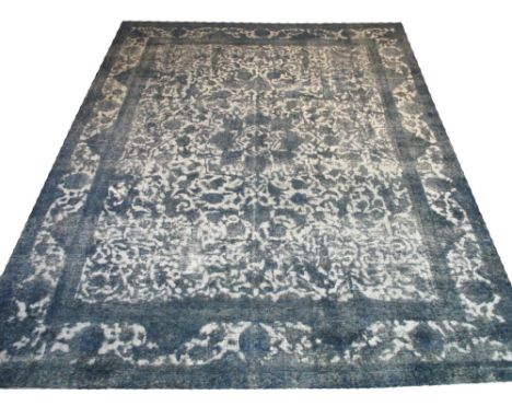 VINTAGE KERMAN CARPET, 390cm x 303cm, palmettes and scrolling vines within corresponding borders.
