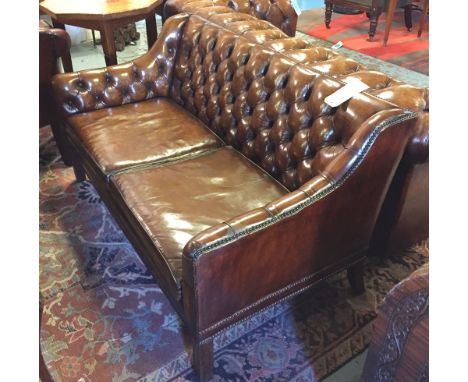 SOFA, Georgian design buttoned tan leather and brass studded with two seat cushions and square supports, 137cm W.