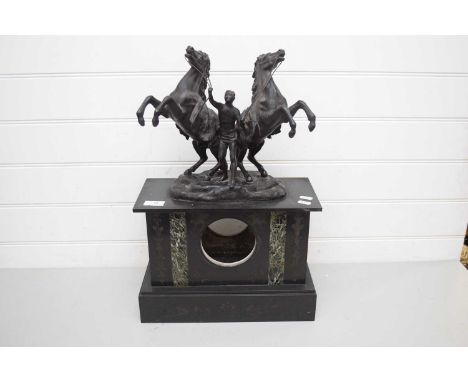 VICTORIAN BLACK SLATE AND MARBLE MOUNTED CLOCK CASE WITH APPLIED SPELTER DECORATION OF MAN WITH REARING HORSES