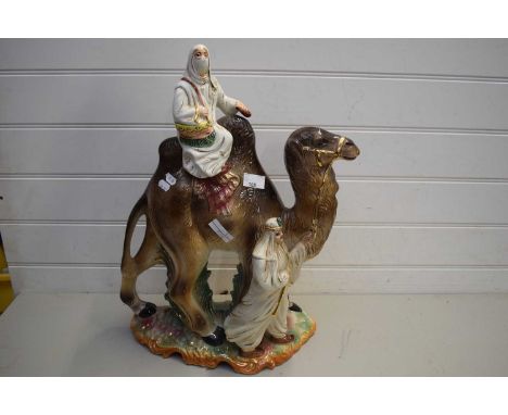 LARGE CAPO DI MONTE MODEL OF CAMEL WITH RIDER AND ATTENDANT FIGURE