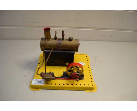 SMALL MAMOD METHANOL ENGINE ON YELLOW METAL STAND