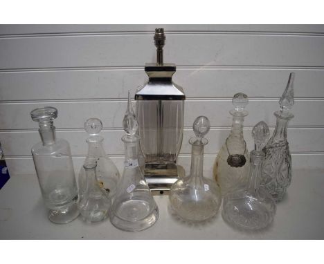 VARIOUS GLASS DECANTERS AND A TABLE LAMP BASE