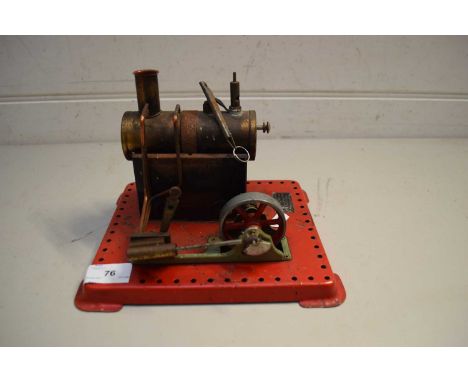 SMALL MAMOD ENGINE ON RED METAL STAND