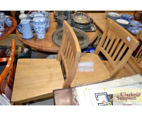 A pair of modern stick back high kitchen chairs 