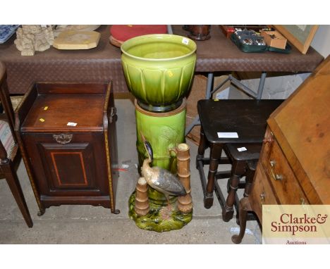 A Majolica style stick stand / jardinière stand with bird decoration AF