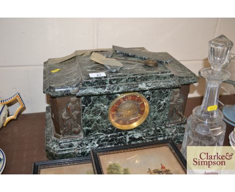 A marble and bronzed mantle clock with classical figural decoration and eight day movement AF