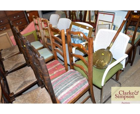Four oak ladder back dining chairs 
