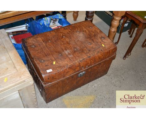 A japanned metal trunk
