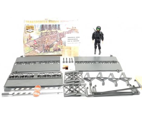 Action Man Vintage group includes Cherilea Transporter Bridge with ramps, supports, lifting barriers, dynamite, detonator and