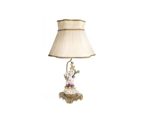 VICTORIAN FIGURAL CERAMIC AND ORMULU TABLE LAMP modelled as a young girl against a tree, on a squareform ormolu base, with cr