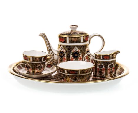 ROYAL CROWN DERBY 'IMARI' PATTERN MINIATURE TEA SERVICE, comprising teapot, cup, saucer, cream, sugar and tray, 1128 pattern,