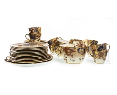 ROYAL CROWN DERBY FLORAL AND GILT PART TEA SERVICE, comprising twelve cups and saucers, eleven sideplates (along with a furth