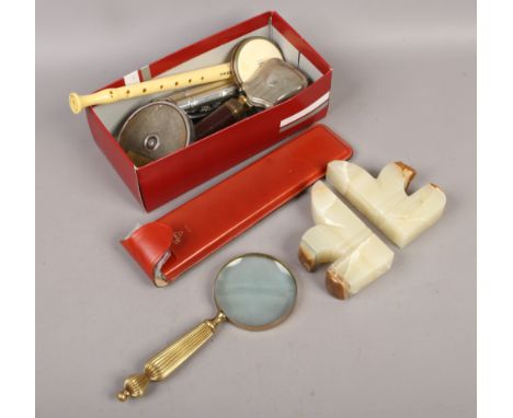 A box of collectables including a brass telescope, brass magnifying glass, onyx bookends, silver plated cigar case, pipe etc.