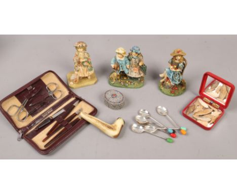 A group of collectables to include silver plate demitasse spoons, arrow heads, Austrian manicure set etc.