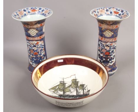 A pair of Japanese Imari vases, along with a lustre and creamware Grays pottery bowl, decorated with ship Caroline.