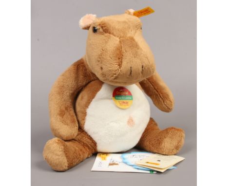 A Steiff soft toy model of a hippopotamus complete with identifying button booklet and original cosy friends label.