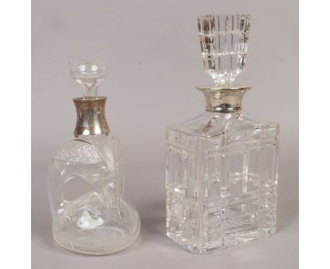A George V silver collared glug-glug cut glass decanter, assayed Birmingham 1911,along with silver collared cut glass decante
