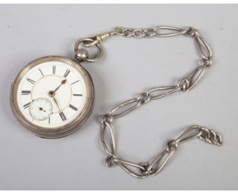A Victorian silver cased pocket watch with subsidiary seconds and white enamel dial, assayed Birmingham 1892 with a single si