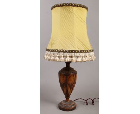 A Pokerwork lamp and shade with floral decoration.