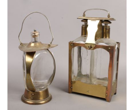 A musical effect two bottle Tantalus along with a similar decanter.