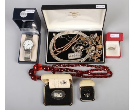 A collection of mostly silver and white metal jewellery to include silver ingot on white metal chain, manual Sekonda expandin