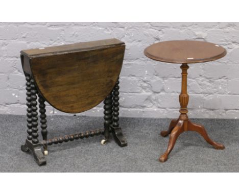 A Victorian bobbin turned occasional Sutherland table along with a tripod wine table.