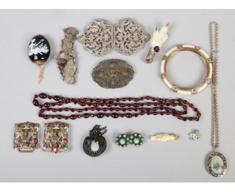 A quantity of costume jewellery including Scottish pheasants foot brooch, gilt metal and enamel belt buckle, coin bracelet, b