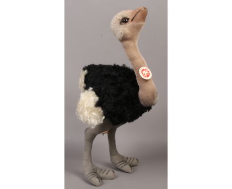 A Steiff soft toy model of an ostrich with identifying button and booklet.