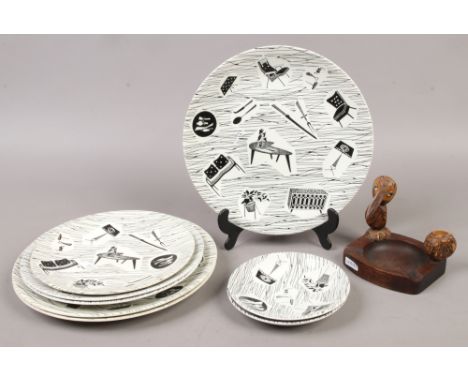 A collection of Homemaker plates and saucers, along with a novelty wooden ashtray.Condition report intended as a guide only.D