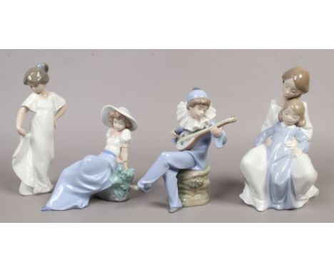 Four Nao ceramic figures to include mother and child, boy playing guitar etc.Condition report intended as a guide only.Bird p