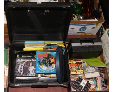 A box and carry case to include Yelco halogen de luxe 8mm projector and a collection of Super 8 reels to include Tom &amp; Je
