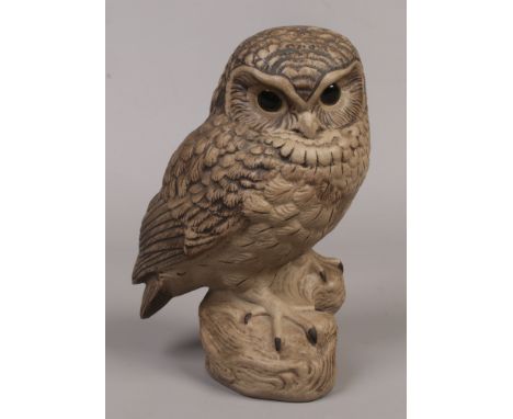 A Poole pottery model of an owl, signature by B. Linley Adams.