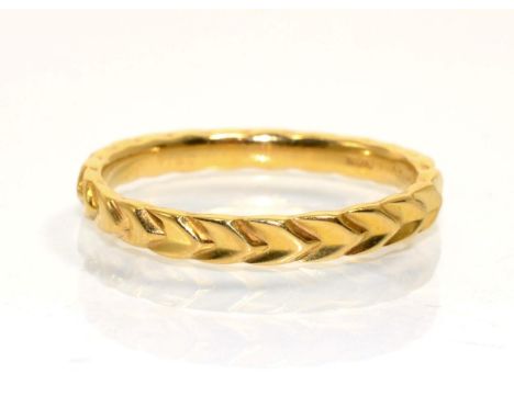 A 22 carat gold chevron motif band ring, finger size R.  4.0g