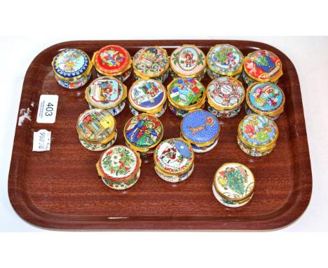 A group of eighteen Halcyon Days enamel Christmas boxes