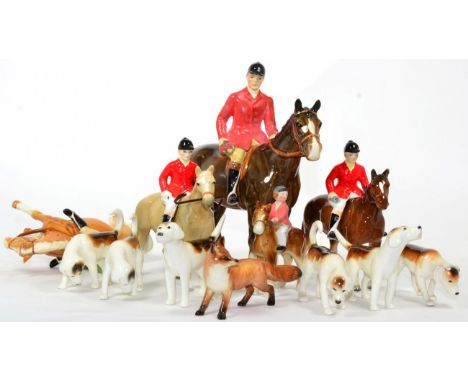 Beswick Hunting Group Comprising: Huntsman, Style Two - Standing, model No. 1501, brown gloss, Fox and six Foxhounds, Boy on 