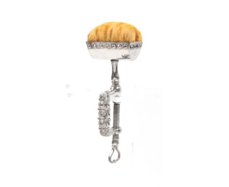 A cut steel sewing clamp with trough form pin cushion top, 12.5cm