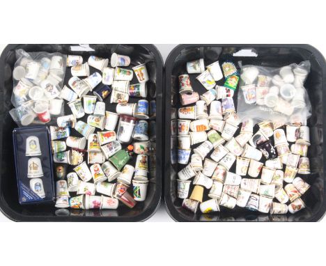 A collection of modern thimbles mostly ceramic including a few Royal Worcester, together with metal and plastic  (qty)