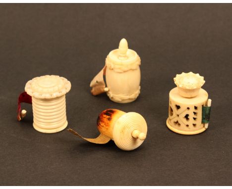 Four bone and ivory tape measures comprising an acorn form example, printed tape marked in nails and quarters, 3.5cm, a pierc