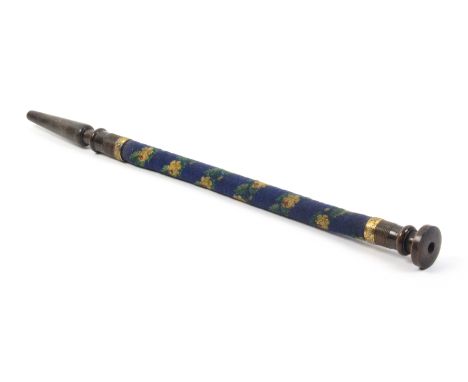 A 19th Century beadwork covered mouthpiece for a hookah pipe, gilt mounted horn end mounts, the flexible cylinder stem worked