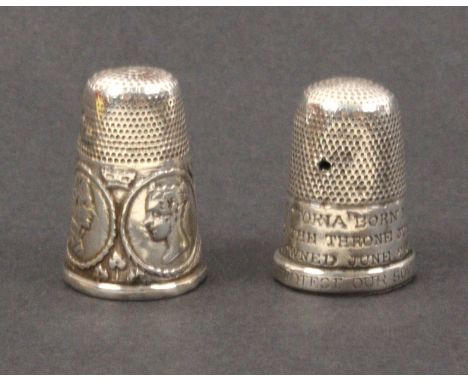 Two English silver commemorative thimbles, one with oval portrait medallions of Queen Victoria and Prince Albert, the other w