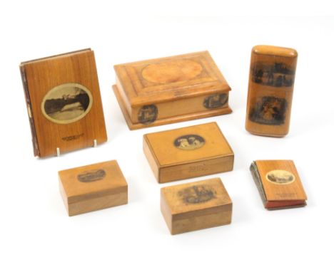 Mauchline ware - seven pieces - comprising a rectangular box (Doune Castle and Hanging Tree/Doune Castle, Interior/lid print 