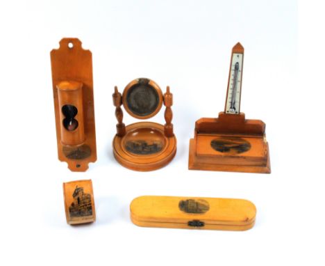 Mauchline ware - five pieces - comprising a curved end razor box (Leamington Lower Parade), 16cm, a dish base watch stand (Ri