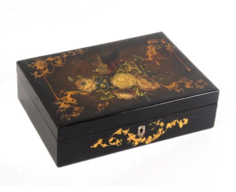 An attractive small papier mache early Victorian sewing box of rectangular form, the lid painted with colourful flowers and a