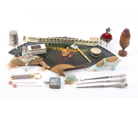 A mixed lot - sewing - comprising a porcelain shoe form pin cushion, 12.5cm, a standing wooden pin cushion as an acorn, 10.5c