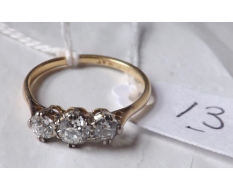 A good 18ct gold & platinum mounted three stone  diamond ring size 'R' 2.2g inc     