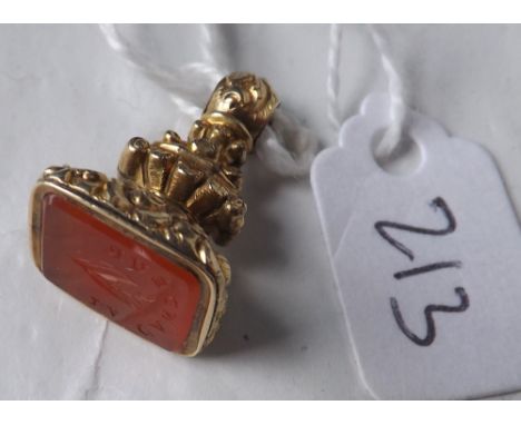 An antique gold cased fob seal mounted with a carved  cornelian intaglio of Lily of the valley & La Candeur  