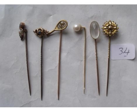 Six assorted antique gold stick pins including  moonstone & amethyst set examples 8.4g inc   
