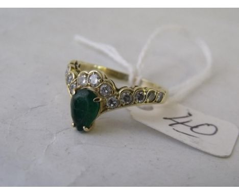 A gold mounted emerald & diamond ring approx size 'N'  3.9g        