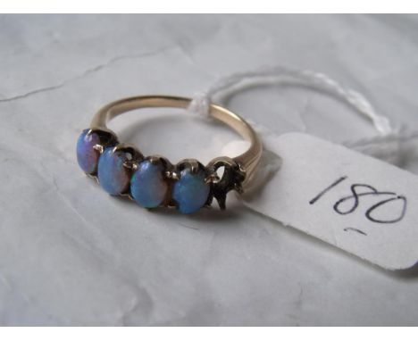 A gold mounted 5 stone(1 missing) blue opal ring  approx size 'I'        